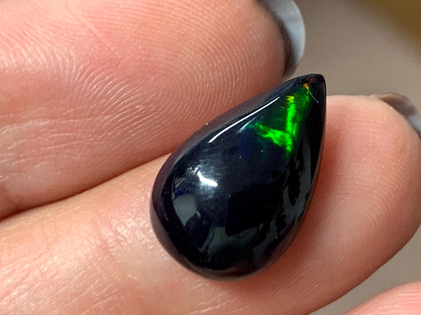 Natural Ethiopian Black Opal 10x16x5mm cabochon