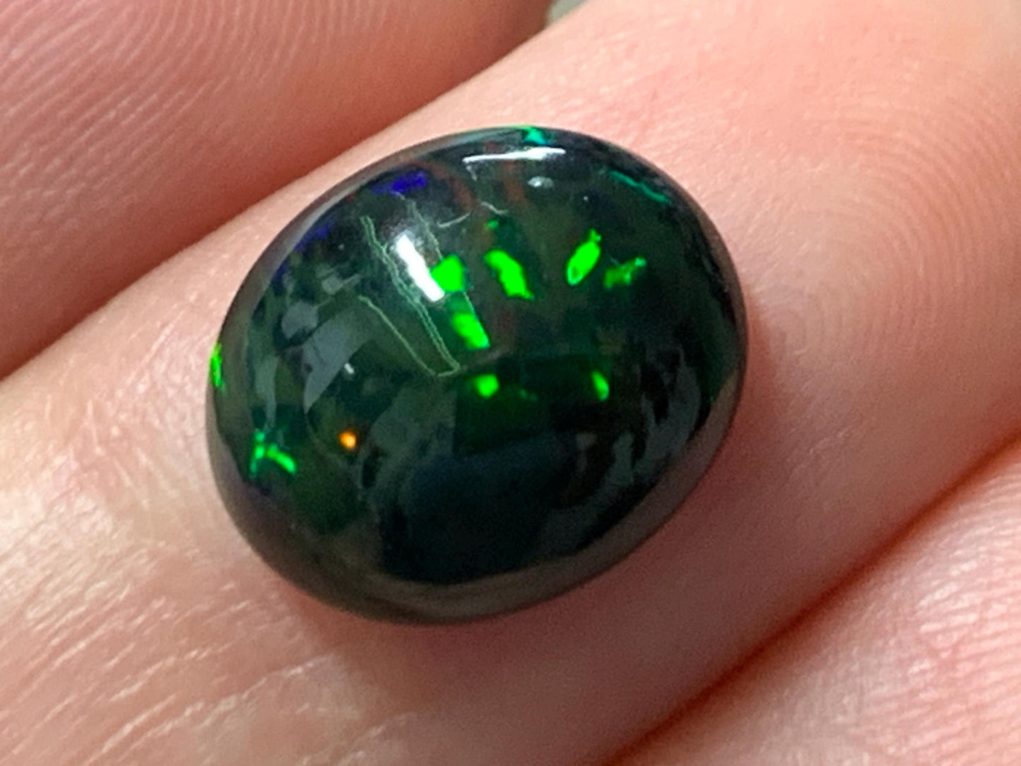 Natural Ethiopian Black Opal 10x12x4.5mm cabochon