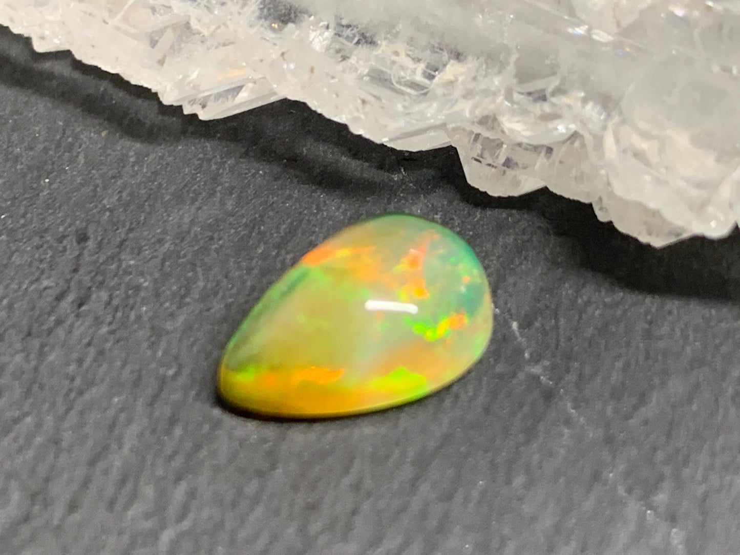 Natural Black Ethiopian Opal pear 8x11x5mm cabochon