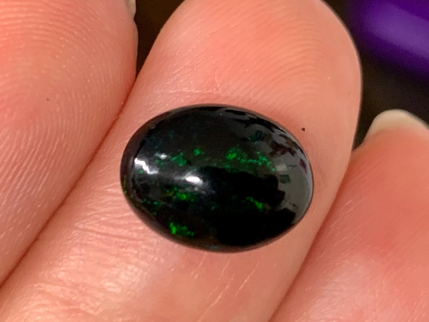 Natural Ethiopian Black Opal 8x11x4mm cabochon