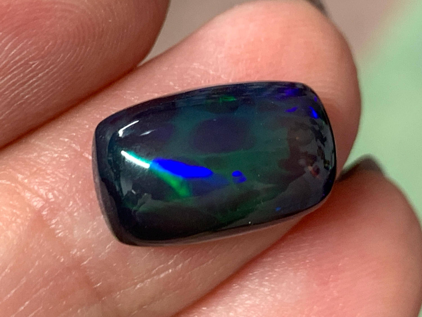 Natural Ethiopian Black Opal 9x14x5mm cabochon