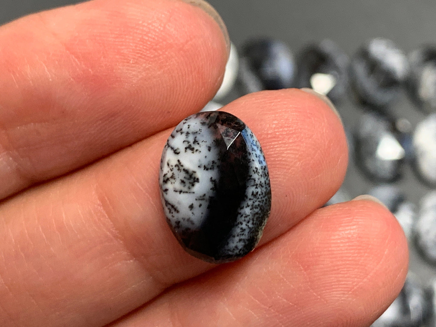 Faceted Dendrite Opal oval 10x14mm cabochon