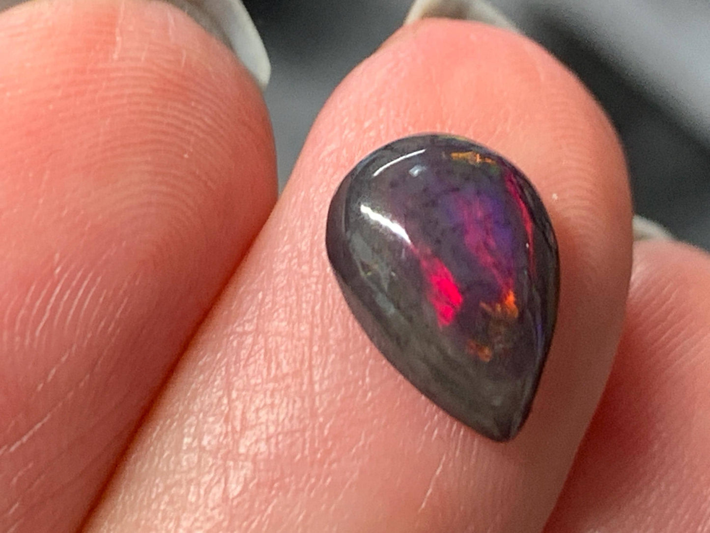 Natural Ethiopian Black Opal 7x11x4mm cabochon