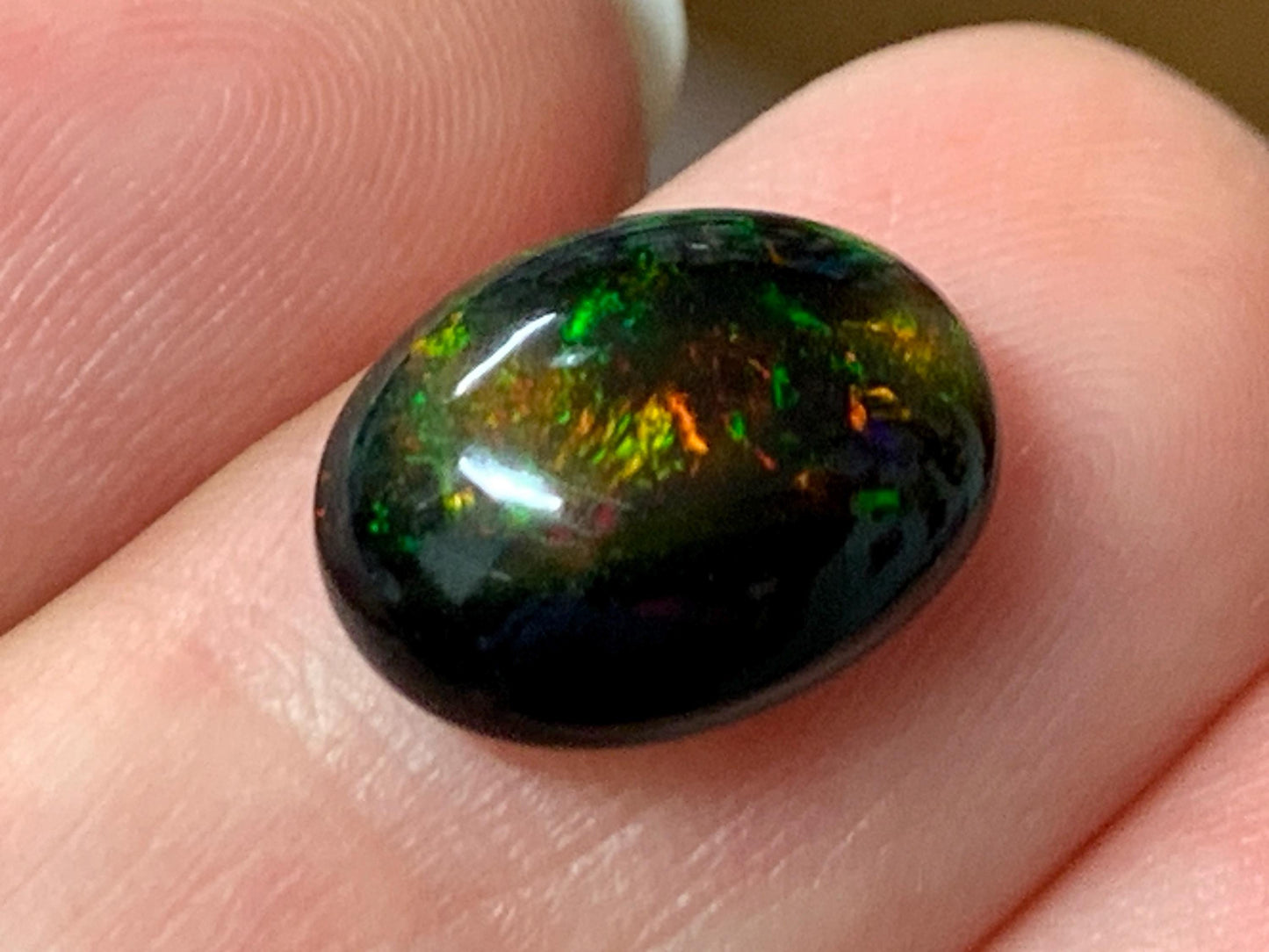 Natural Ethiopian Black Opal 9x12x5mm cabochon