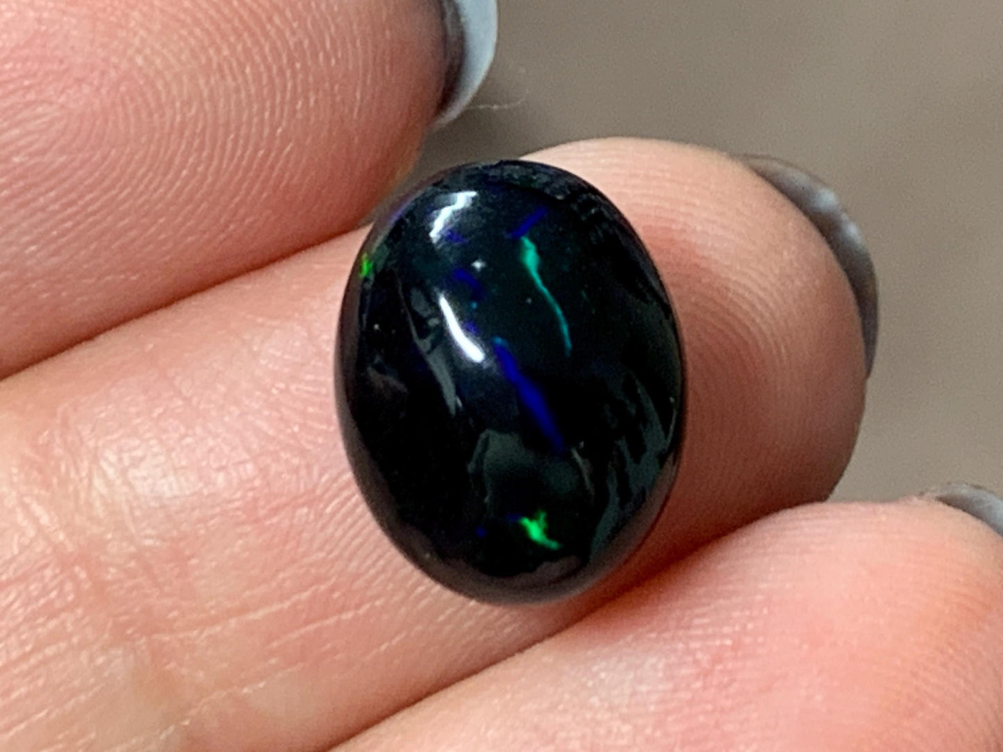 Natural Ethiopian Black Opal 10x12x5mm cabochon