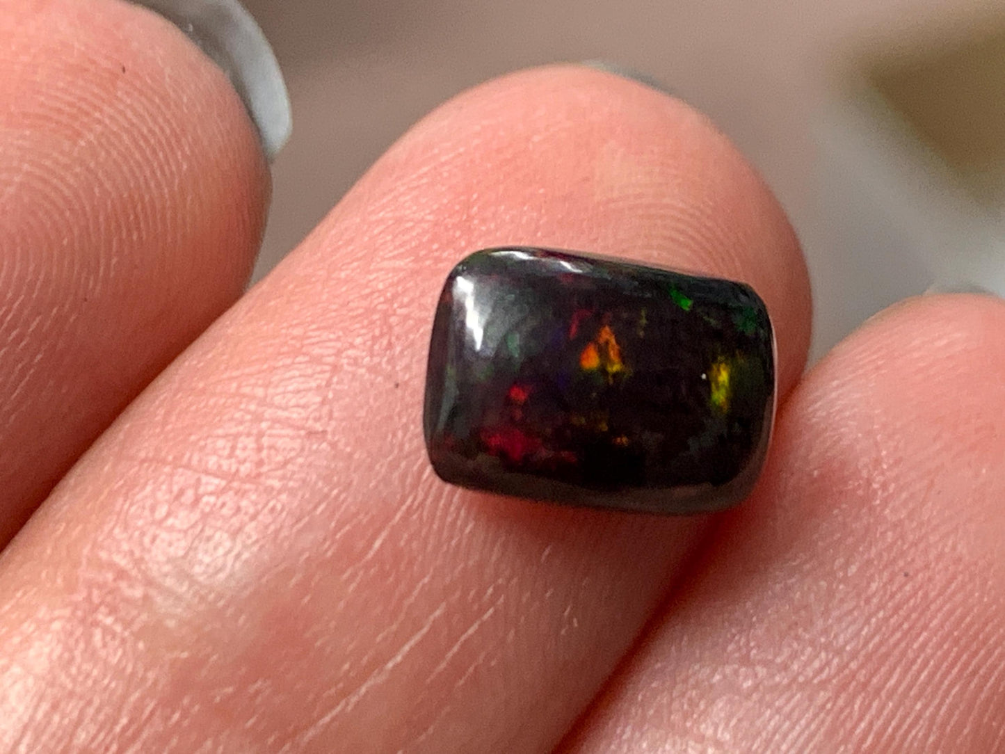 Natural Ethiopian Black Opal 6x9x3mm cabochon